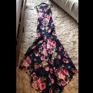 Fitted floral gown with trail